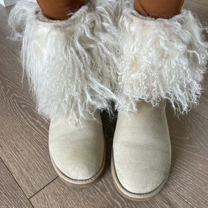 Vintage Ugg boots. Mongolian fur trim. Used with very small stains in pictures